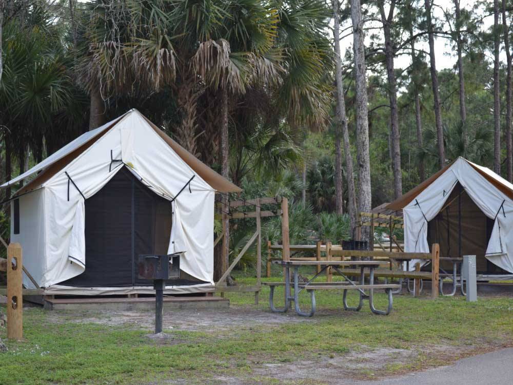 Two of the canvas cabins at LION COUNTRY SAFARI KOA