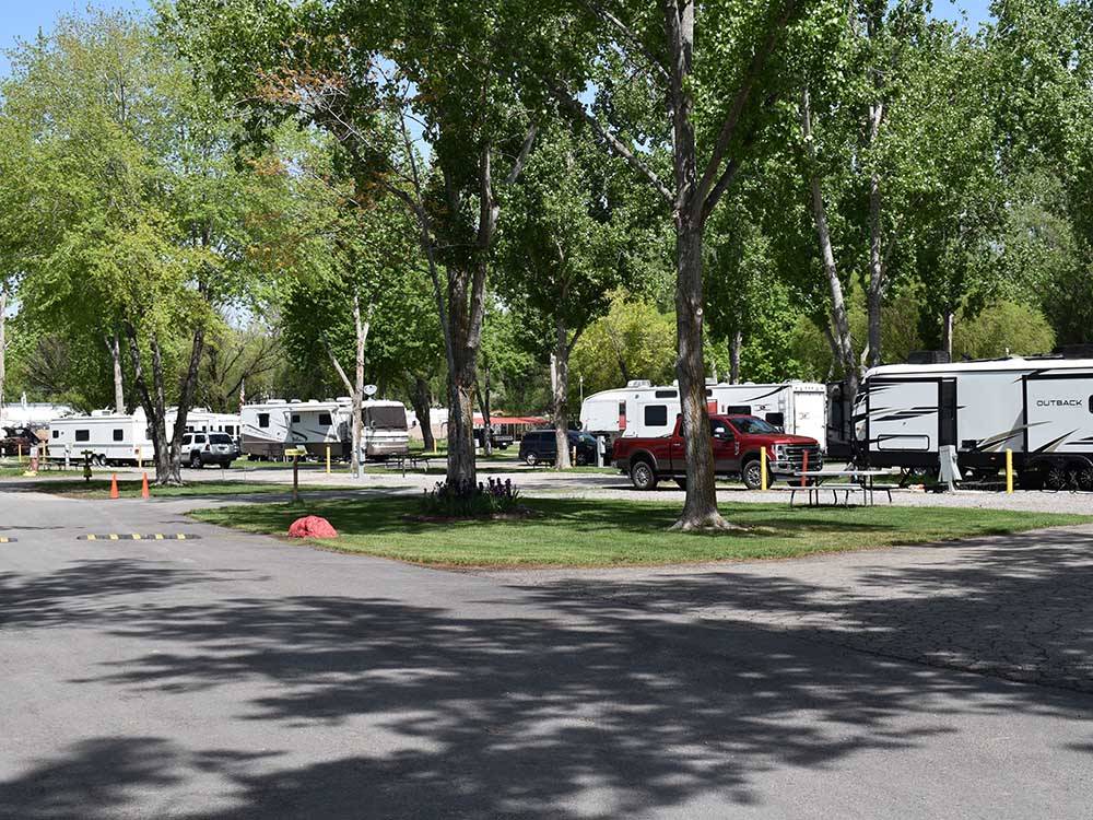 A row of travel trailers in RV sites at LAKESIDE RV CAMPGROUND