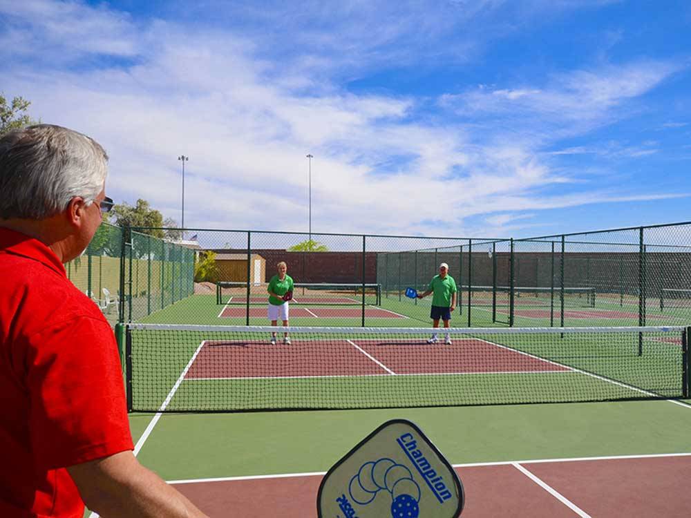 Campers playing pickleball at VALLE DEL ORO RV RESORT