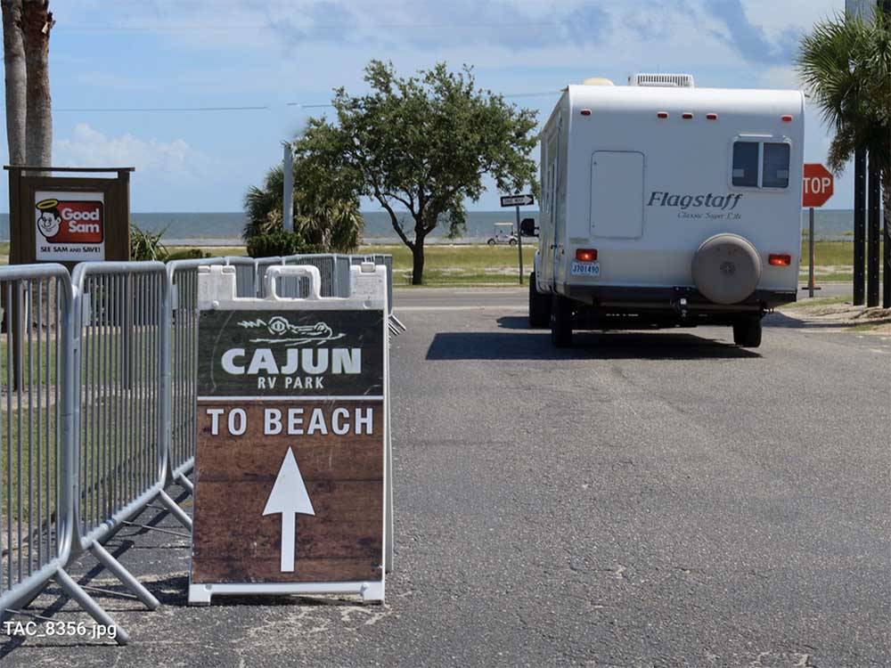 The sign that points you to the beach at CAJUN RV PARK