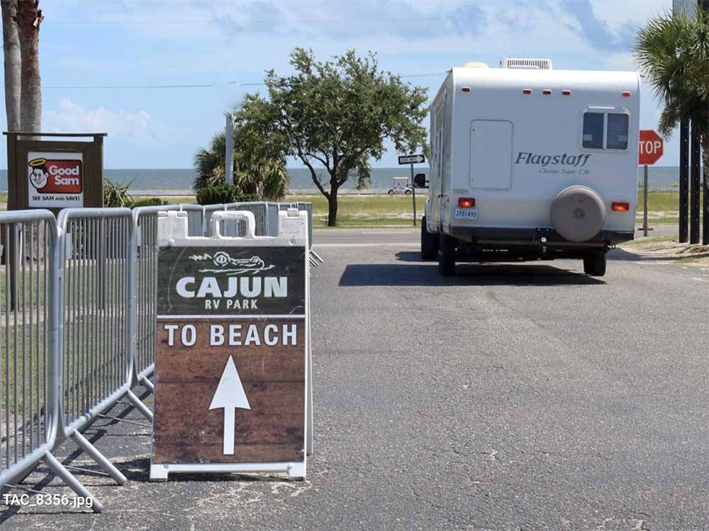 The sign that points you to the beach at CAJUN RV PARK