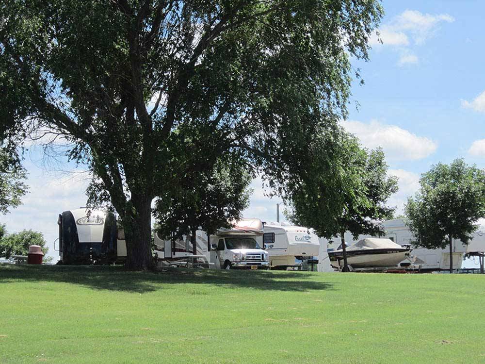 Trailers and boats camping at OASIS CAMPGROUND