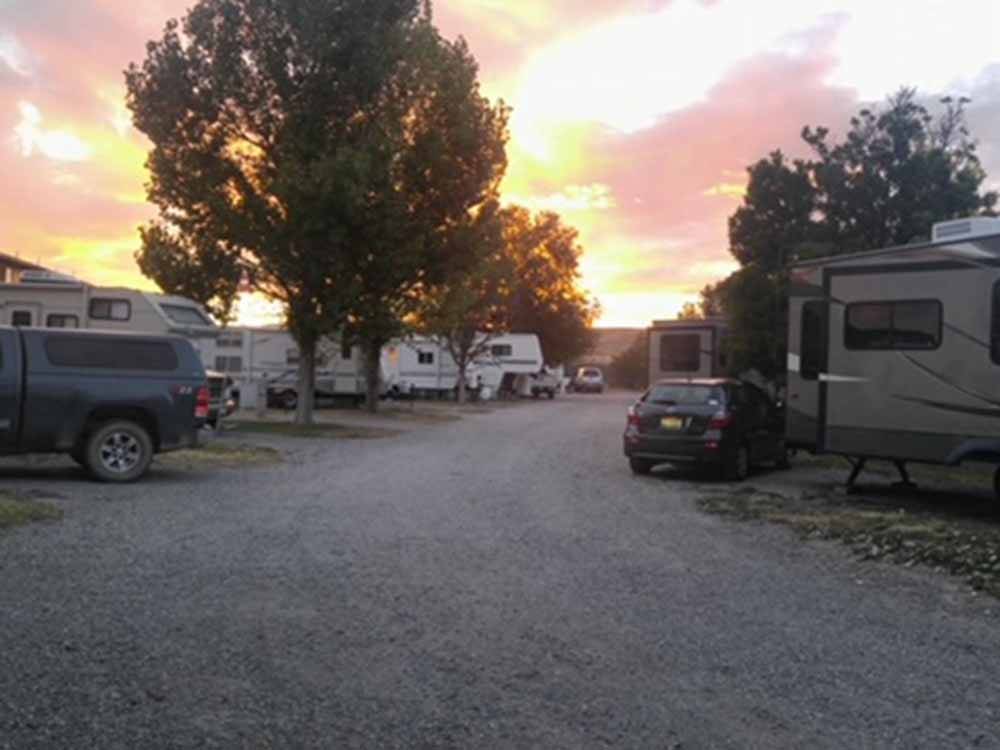 The gravel road between RV sites at MOUNTAIN SHADOWS RV PARK