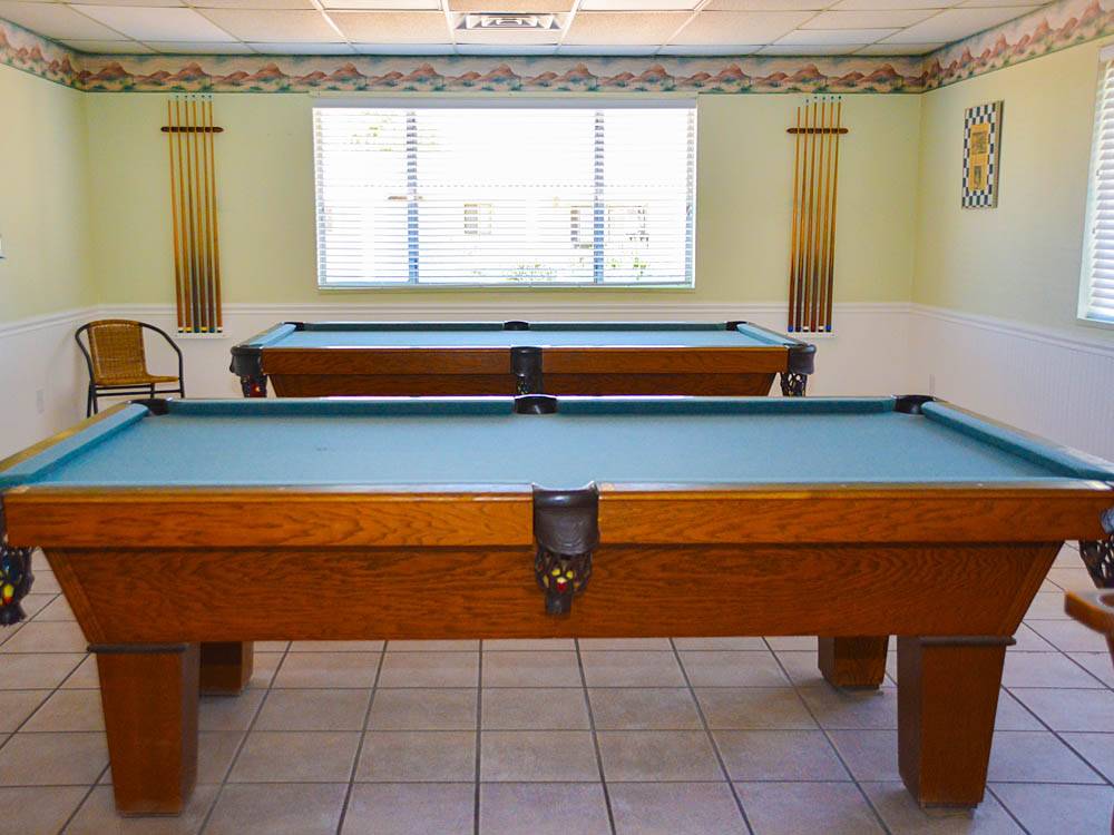 Pool tables in game room at ENCORE CASITA VERDE