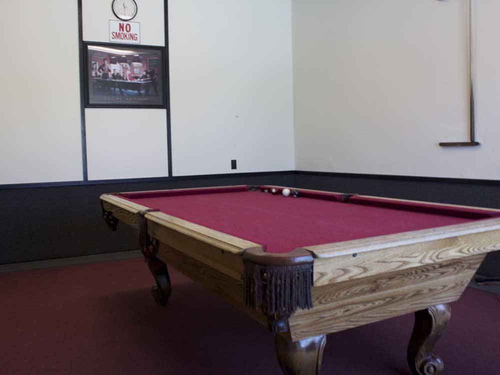 The red billiard pool table at DESERT WILLOW RV RESORT