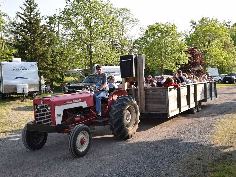 Guest enjoying a hay ride at CAMPARK RESORTS FAMILY CAMPING & RV RESORT