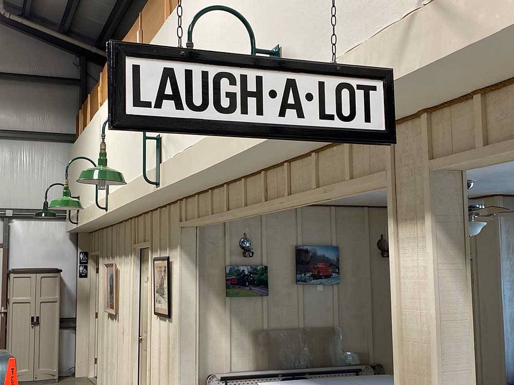 The hanging Laugh-A-Lot sign at RIO CHAMA RV PARK