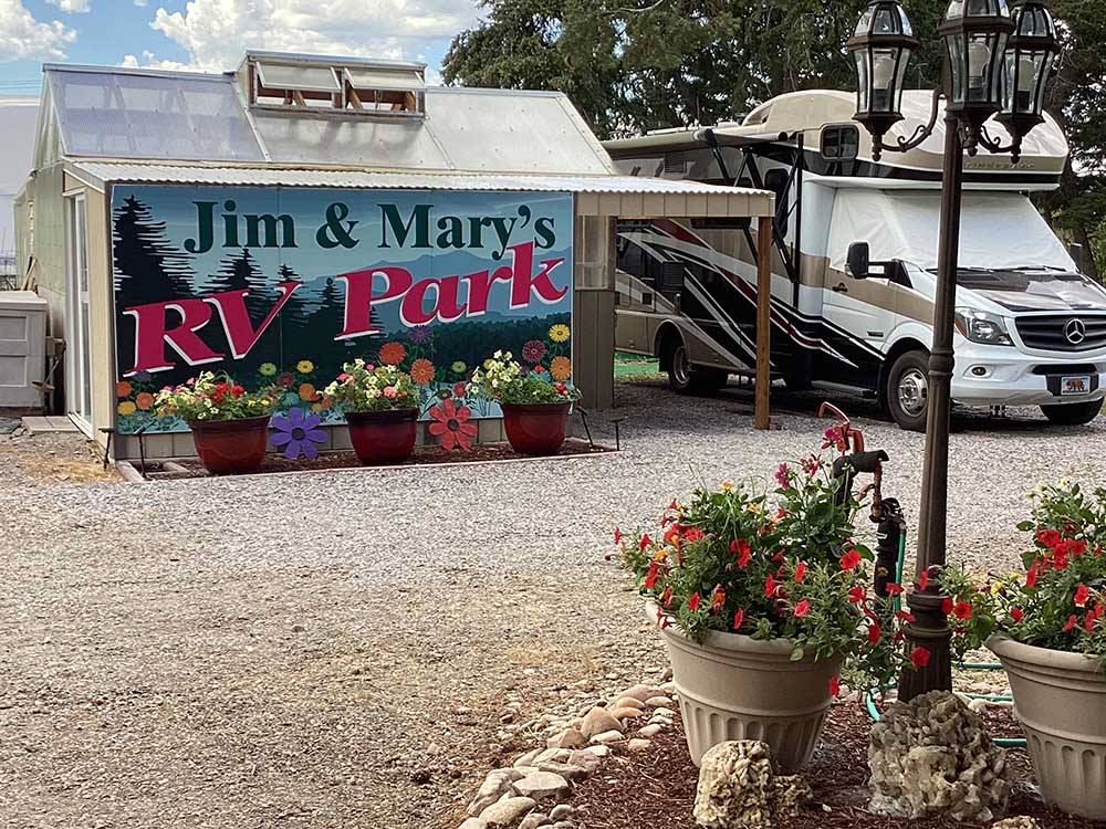 A motorhome by the office at JIM & MARY'S RV PARK