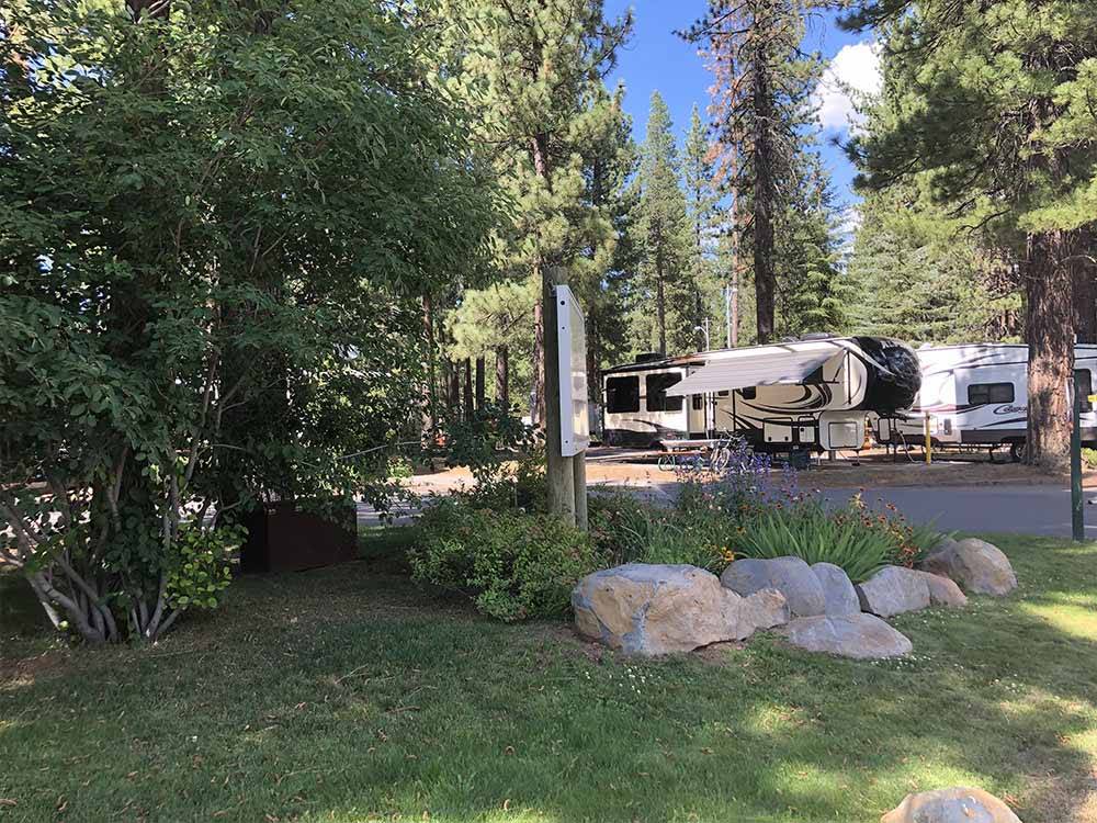 One of the planter areas with boulders at COACHLAND RV RESORT / VILLAGE CAMP TRUCKEE