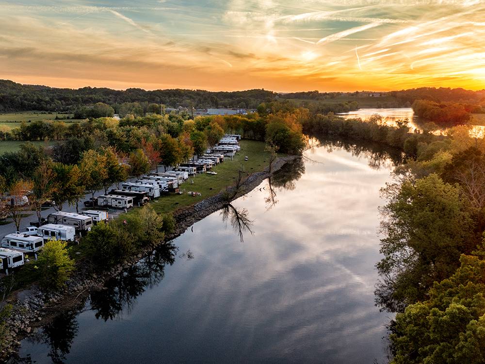 An aerial view of the sites next to the river at RIVERSIDE RV PARK & RESORT