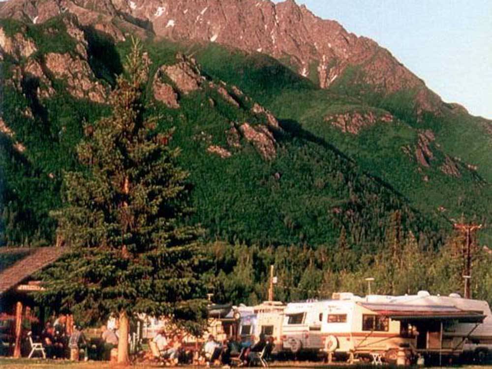 RVs parked near majestic mountains at MOUNTAIN VIEW RV PARK