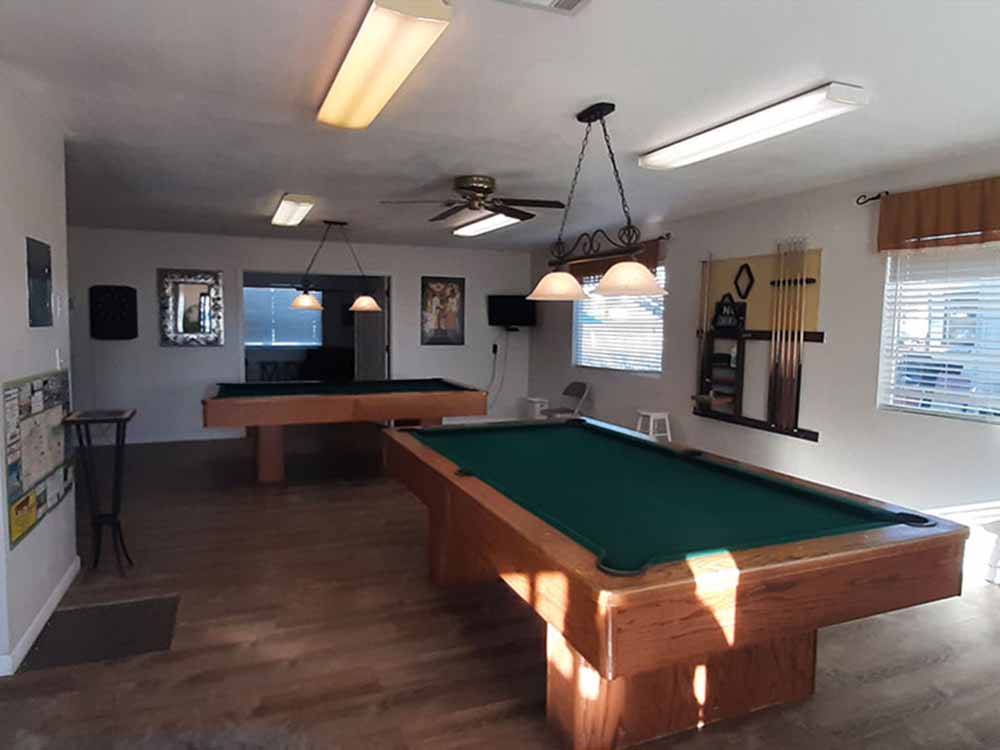 The pool tables in the clubhouse at LITTLE VINEYARD RV RESORT