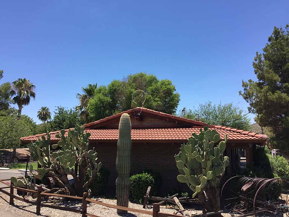The main building with cactus at HORSPITALITY RV RESORT