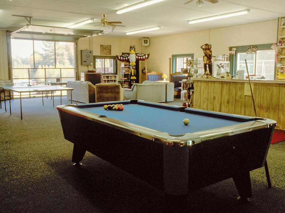 The pool table in the recreation hall at TWIN TAMARACK FAMILY CAMPING & RV RESORT