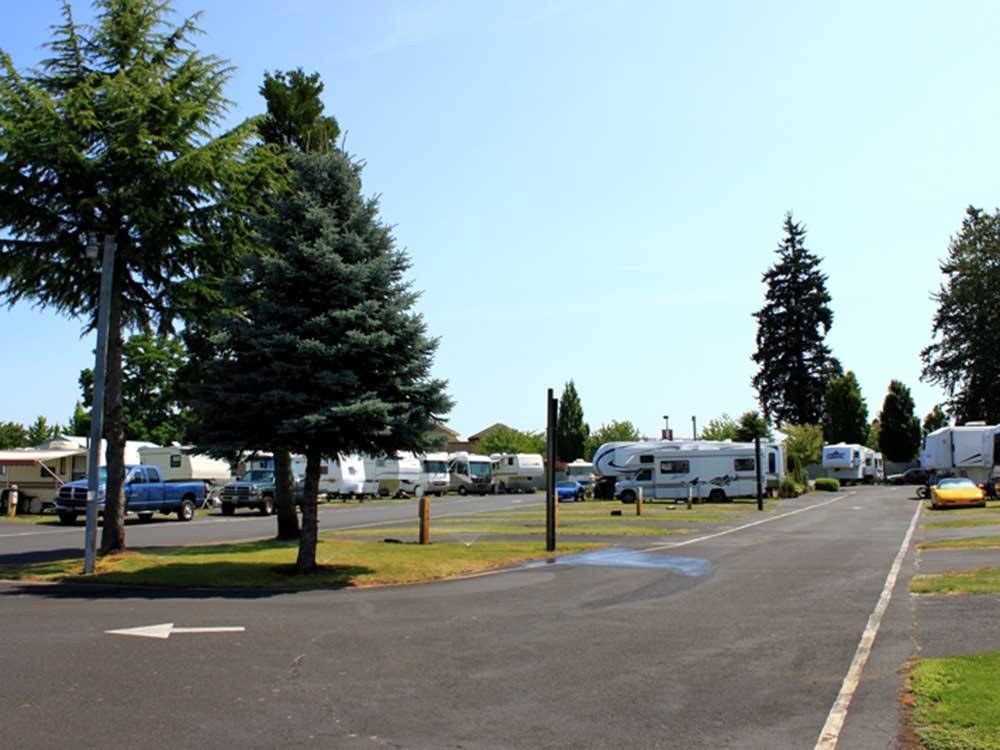 A paved road leading to the RV sites at PORTLAND WOODBURN RV PARK