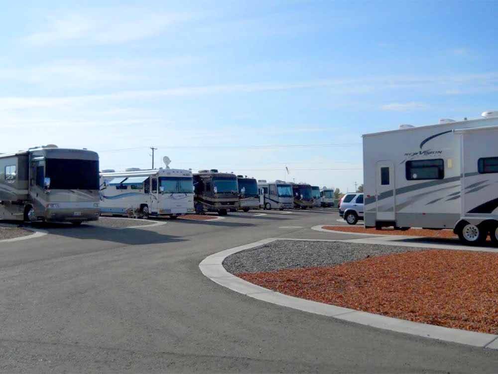 A paved road between RV sites at AMERICAN RV RESORT