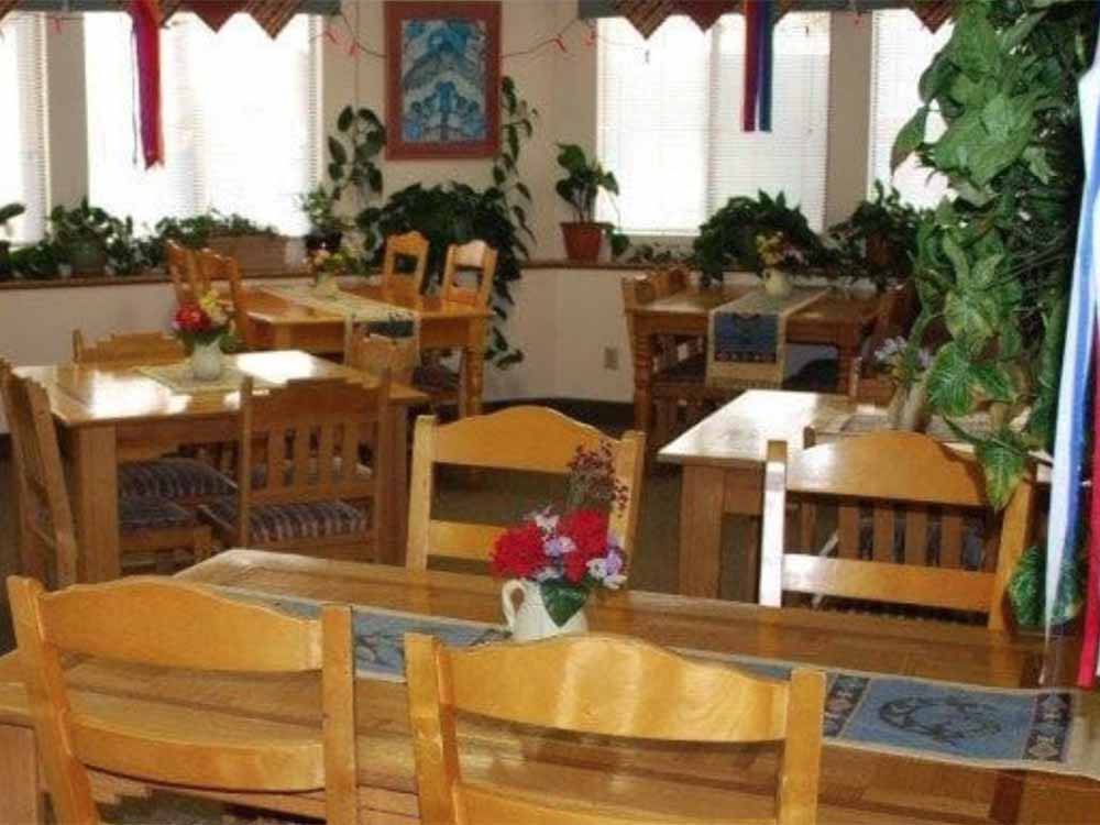 An indoor seating area at the restaurant at AMERICAN RV RESORT