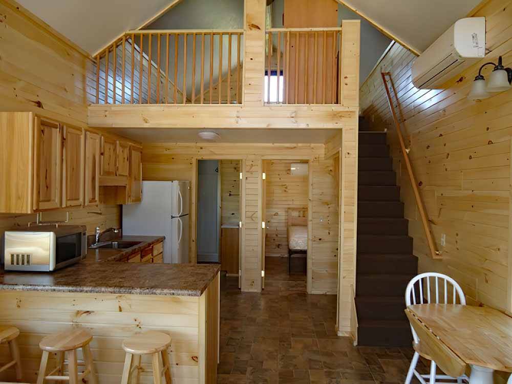The kitchen area in the rental cottage at PONCHO'S POND