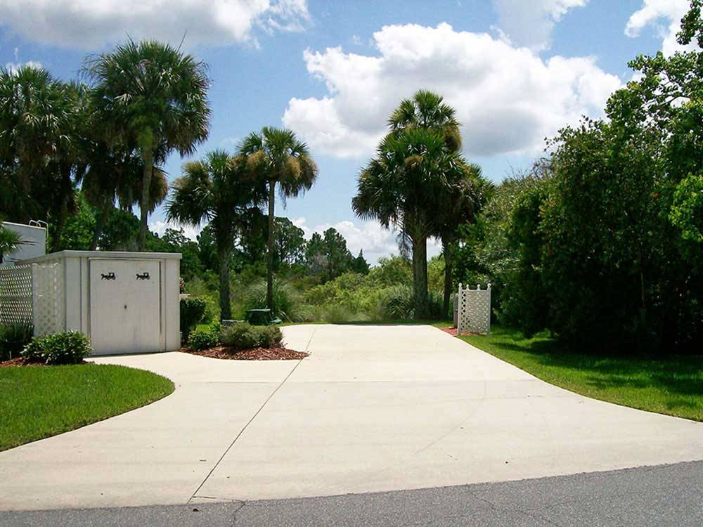 A large paved back in site at THE GREAT OUTDOORS RV NATURE & GOLF RESORT