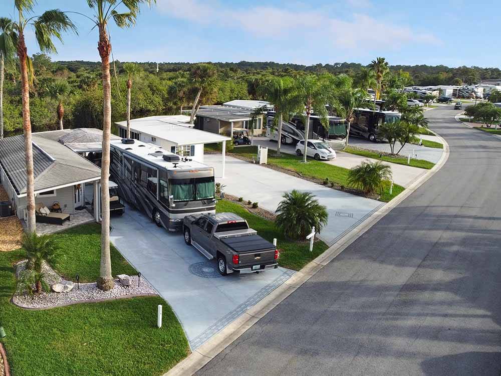 A row of paved deluxe RV sites at THE GREAT OUTDOORS RV NATURE & GOLF RESORT