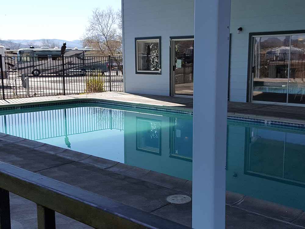 The swimming pool area at SILVER CITY RV RESORT