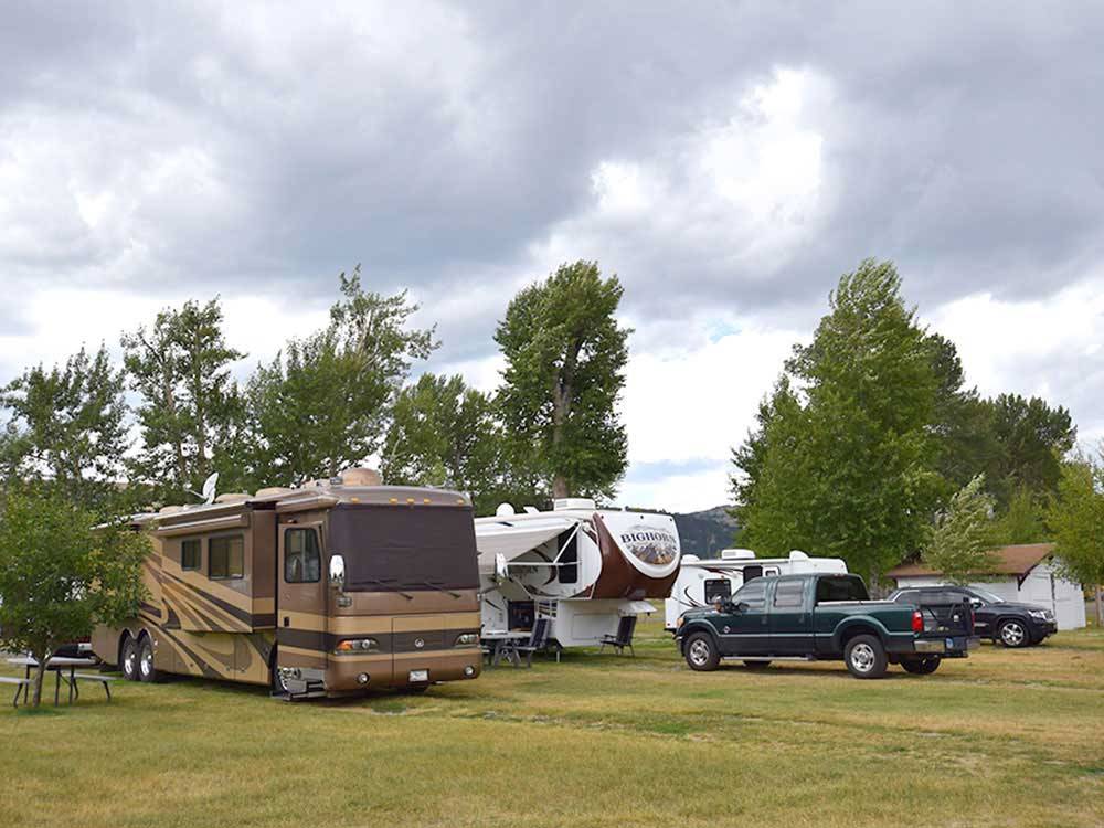 RVs and trailers at campground at RIVERFRONT RV PARK