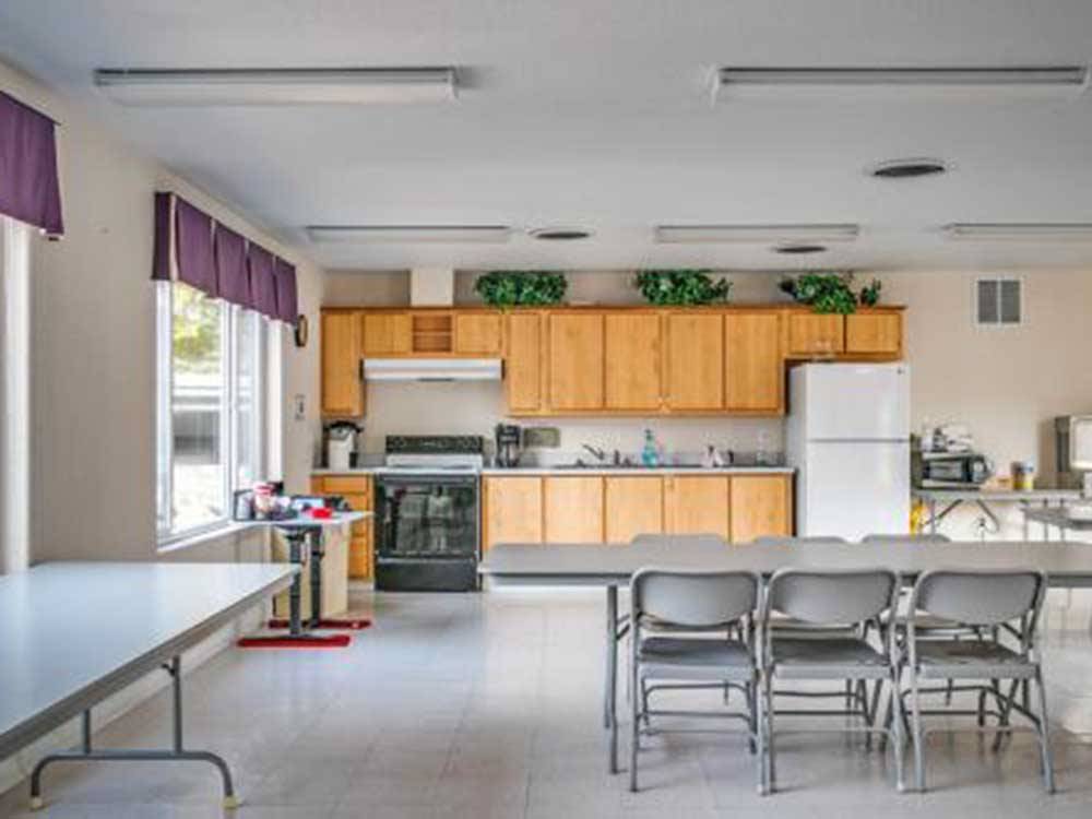 Inside the kitchen and dining area at BROOKHOLLOW RV PARK