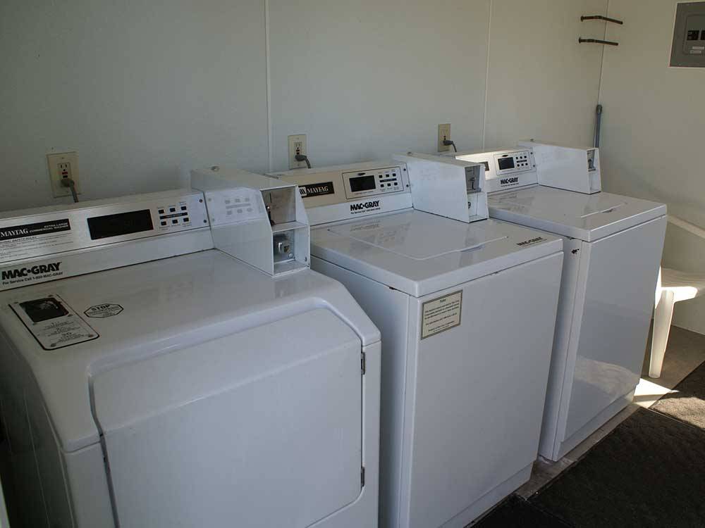 Washers and dryer in the laundry room at NIAGARA FALLS CAMPGROUND & LODGING