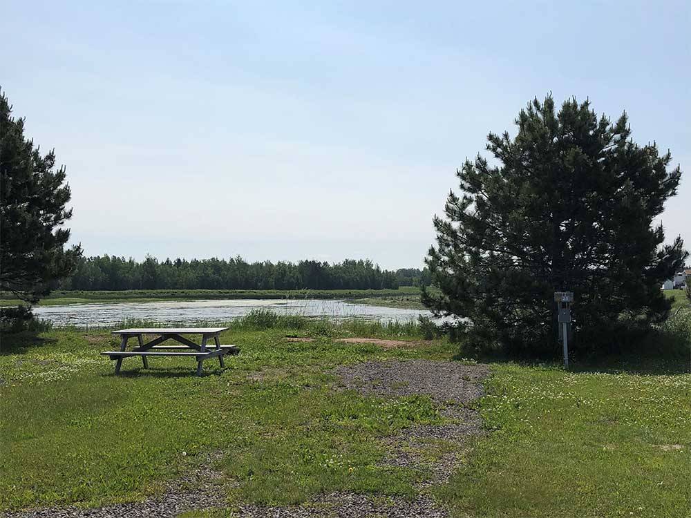 Picnic table overlooking the water at OCEAN SURF RV PARK