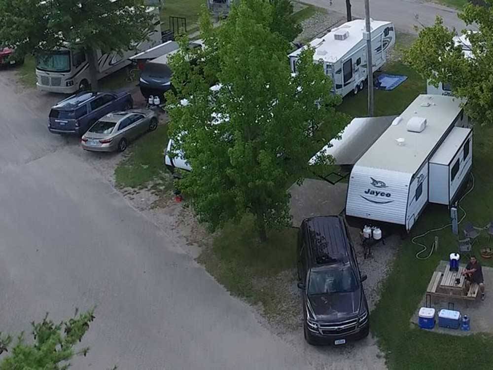 Aerial view over campground of vehicles and RVs at CAHOKIA RV PARQUE