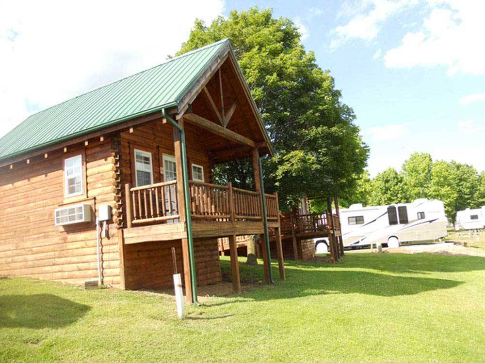 Log Cabins with decks at FORT CHISWELL RV PARK