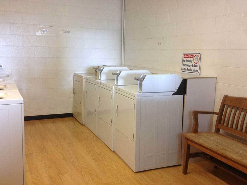 Laundry room with washers and dryers at FORT CHISWELL RV PARK