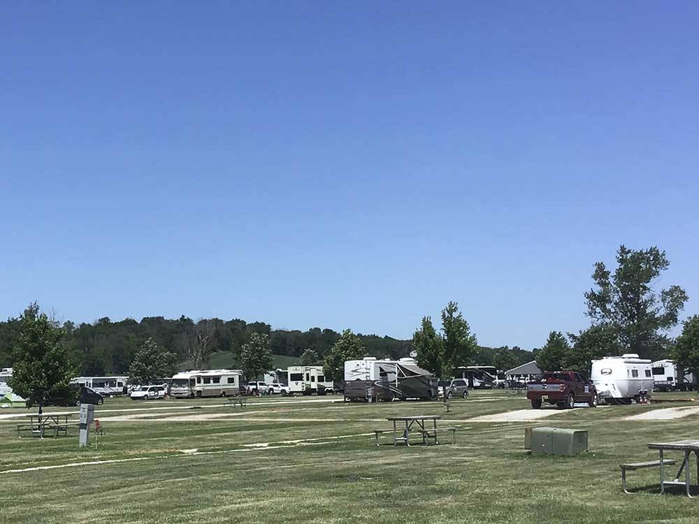 RVs parked on-site on sunny day at AMANA RV PARK & EVENT CENTER