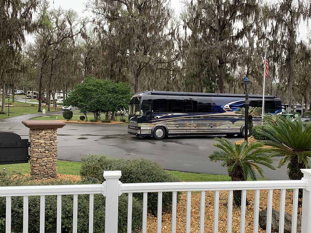 A Class A Motorhome pulling in at OCALA NORTH RV RESORT