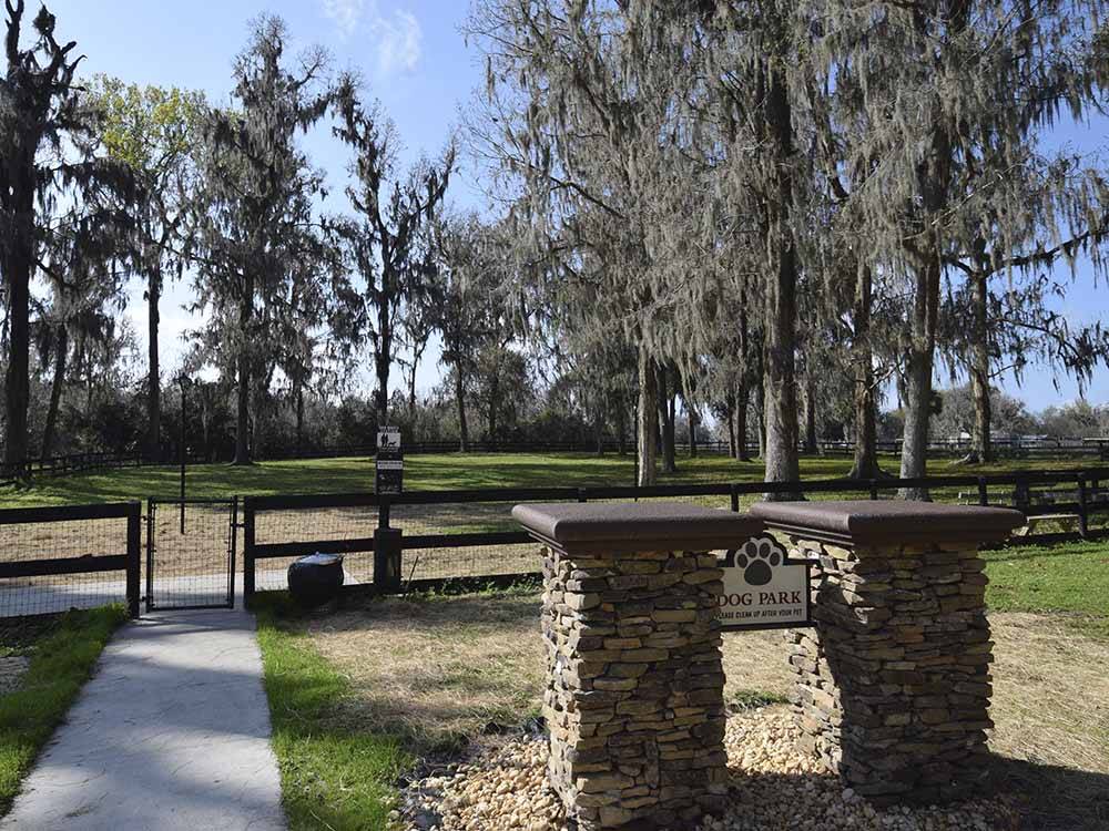 The fenced in dog park area at OCALA NORTH RV RESORT