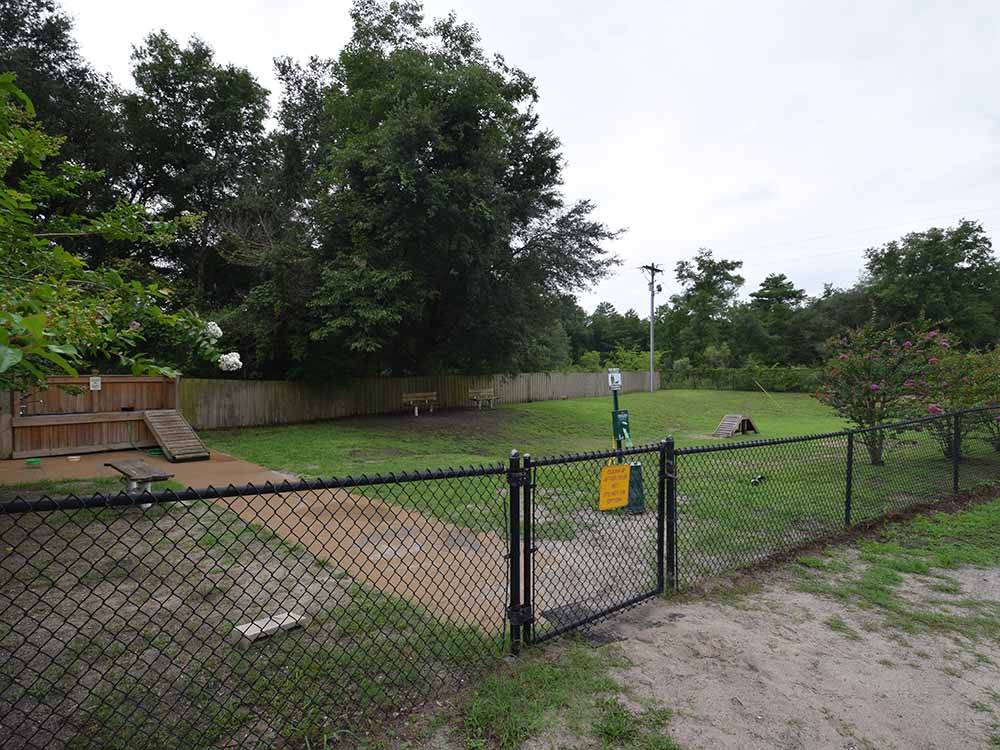 The fenced in pet area at OCALA SUN RV RESORT