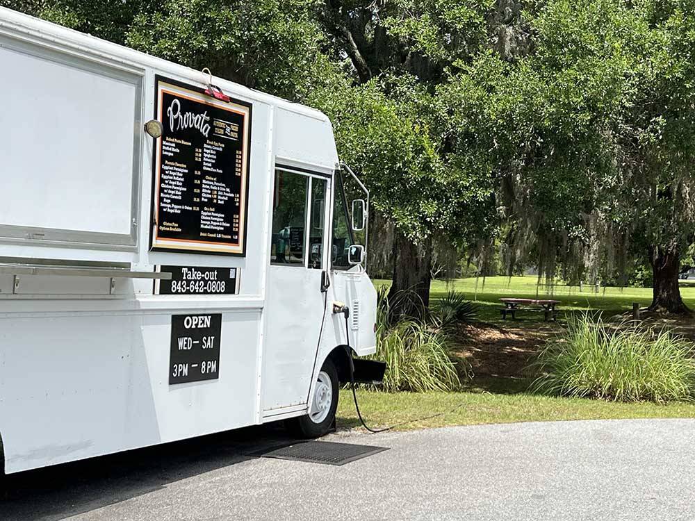 A catering truck parked at OAK PLANTATION CAMPGROUND