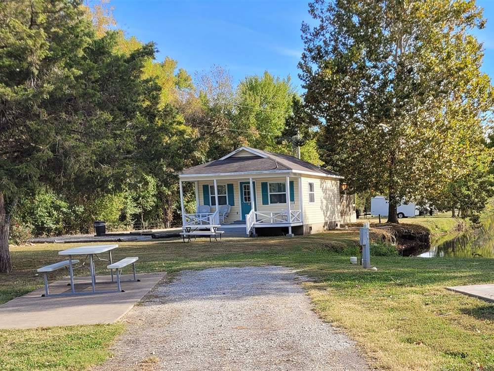 One of the rentals with a deck at GRAND LAKE O' THE CHEROKEES RV RESORT BY RJOURNEY