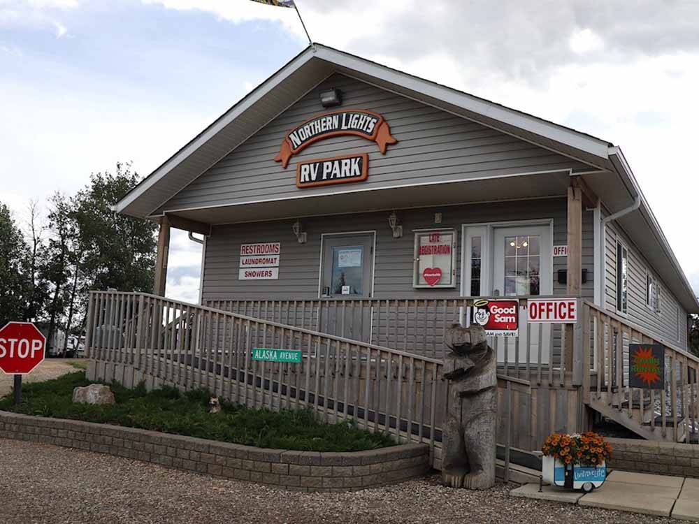 RV park office with signage at NORTHERN LIGHTS RV PARK