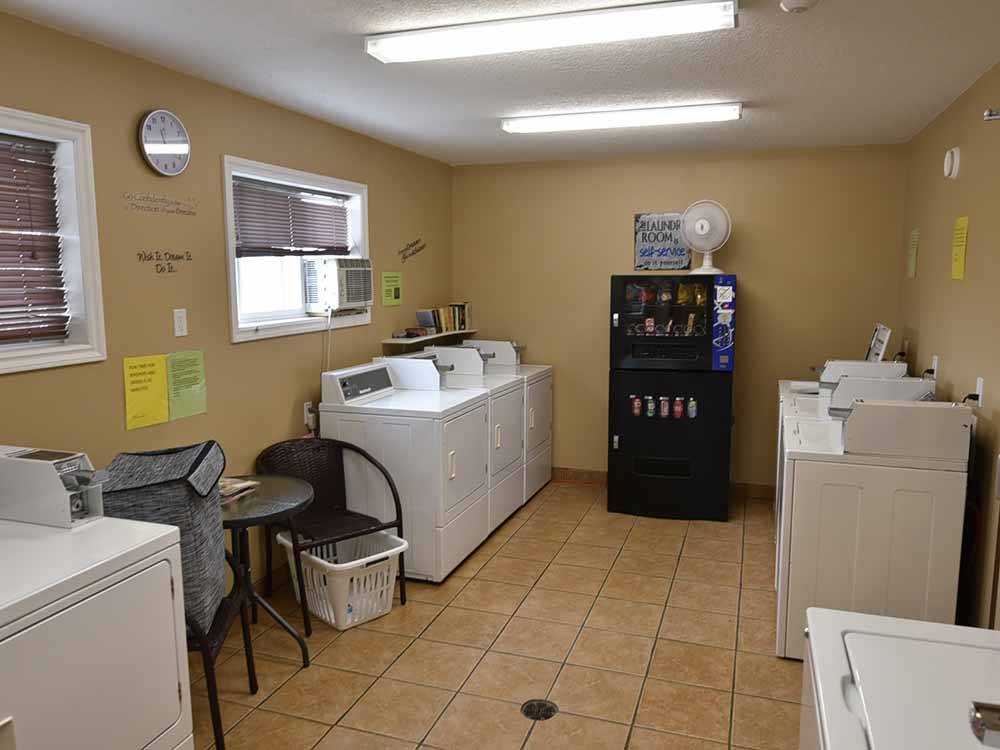 Laundry room with window and vending machine at NORTHERN LIGHTS RV PARK