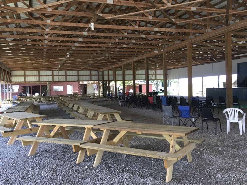 Patio area with picnic tables at DAD'S BLUEGRASS CAMPGROUND