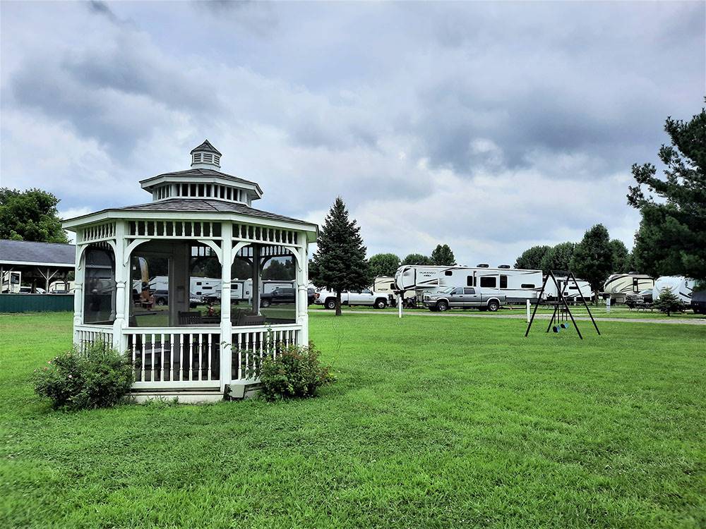 A white gazebo with chairs at SHIPSHEWANA CAMPGROUND SOUTH PARK