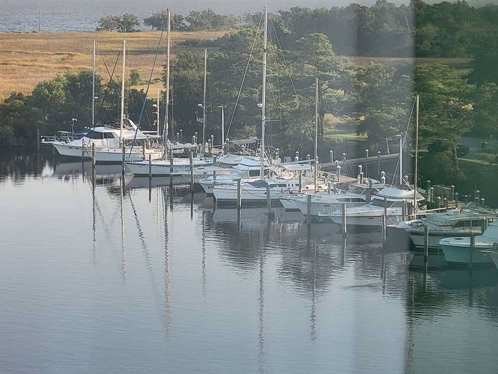 View of sailboats in a marina at HOLLYWOOD CASINO RV PARK- GULF COAST