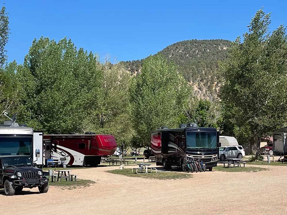 A row of gravel RV sites at BAUER'S CANYON RANCH RV PARK