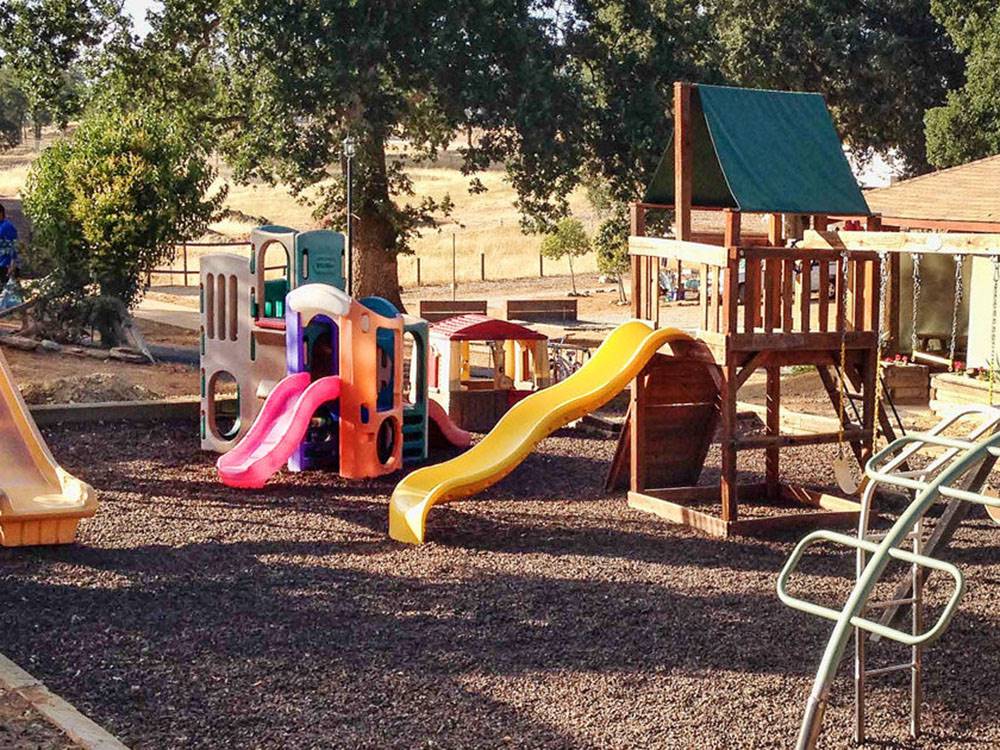 Playground with several slides at ANGELS CAMP RV RESORT