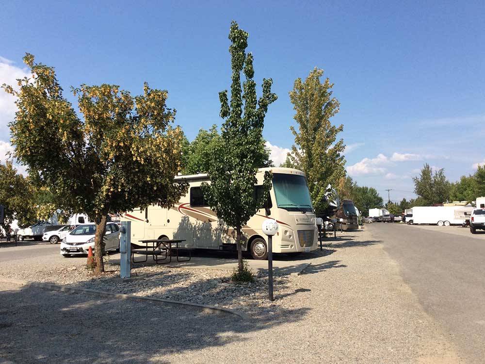 RV parked in a gravel site at COEUR D'ALENE RV RESORT