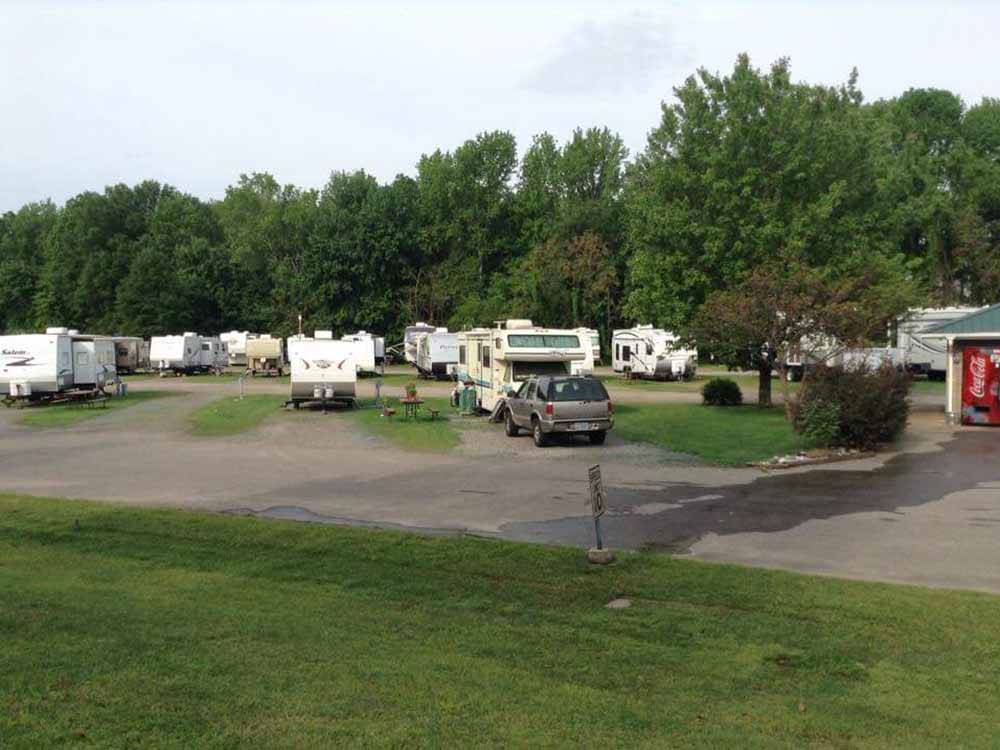 Paved road leading to RV spots at OUTDOOR LIVING CENTER RV PARK
