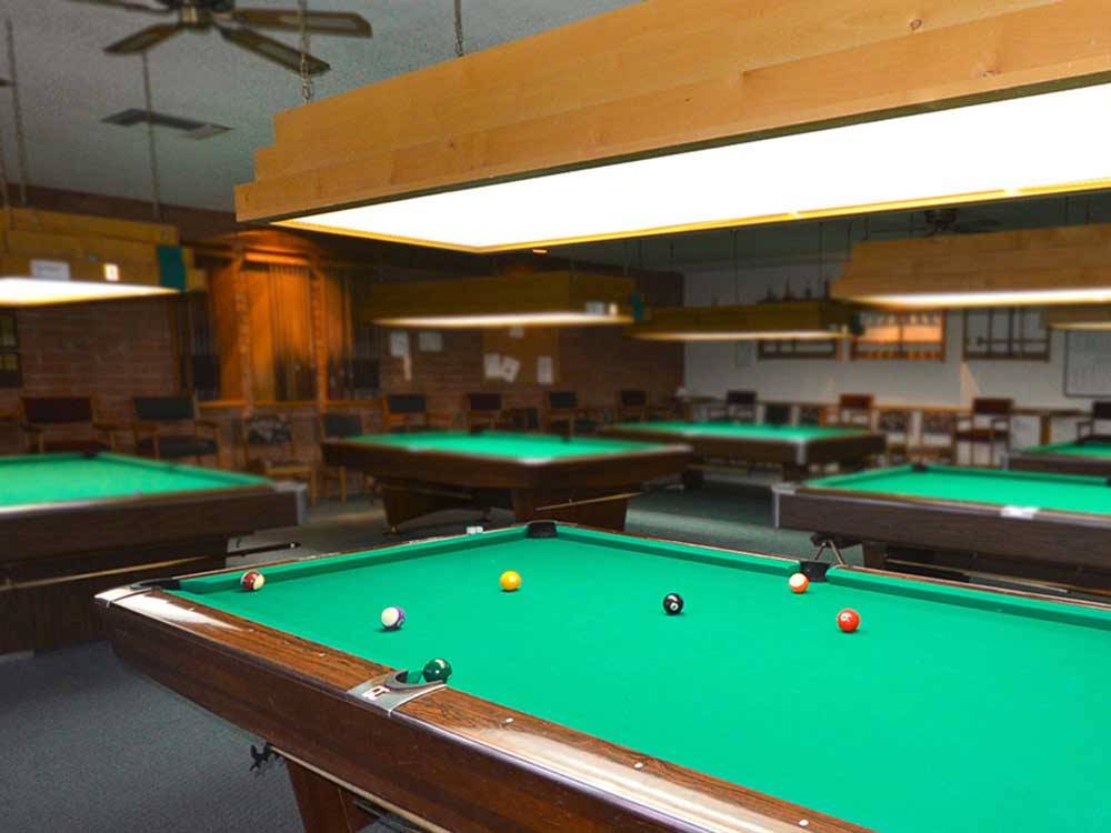 Pool tables in game room at APACHE WELLS RV RESORT