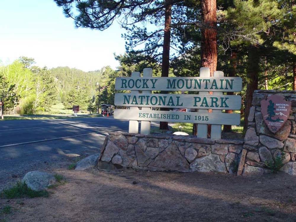 Sign indicating Rocky Mountain National Park at ELK MEADOW LODGE AND RV RESORT