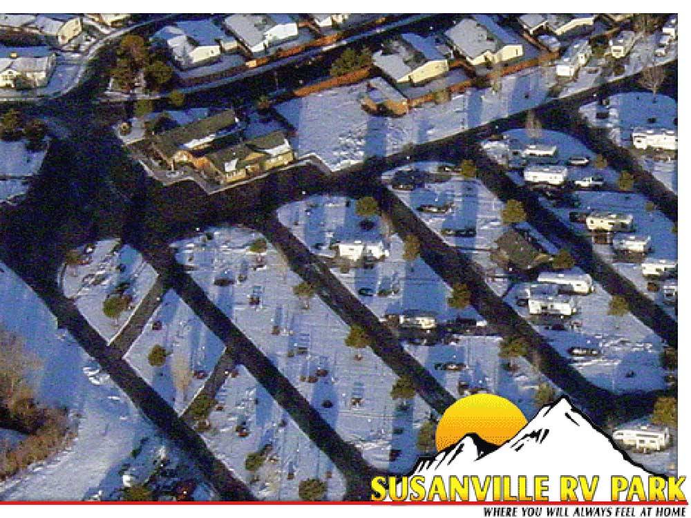 RV sites covered in snow at SUSANVILLE RV PARK